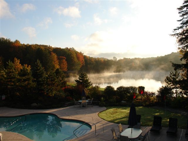 A pool and outdoor area at Beaver Hollow Conference Center						
